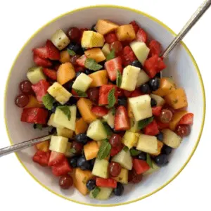 Seasonal fruits with mint and honey-lime dressing